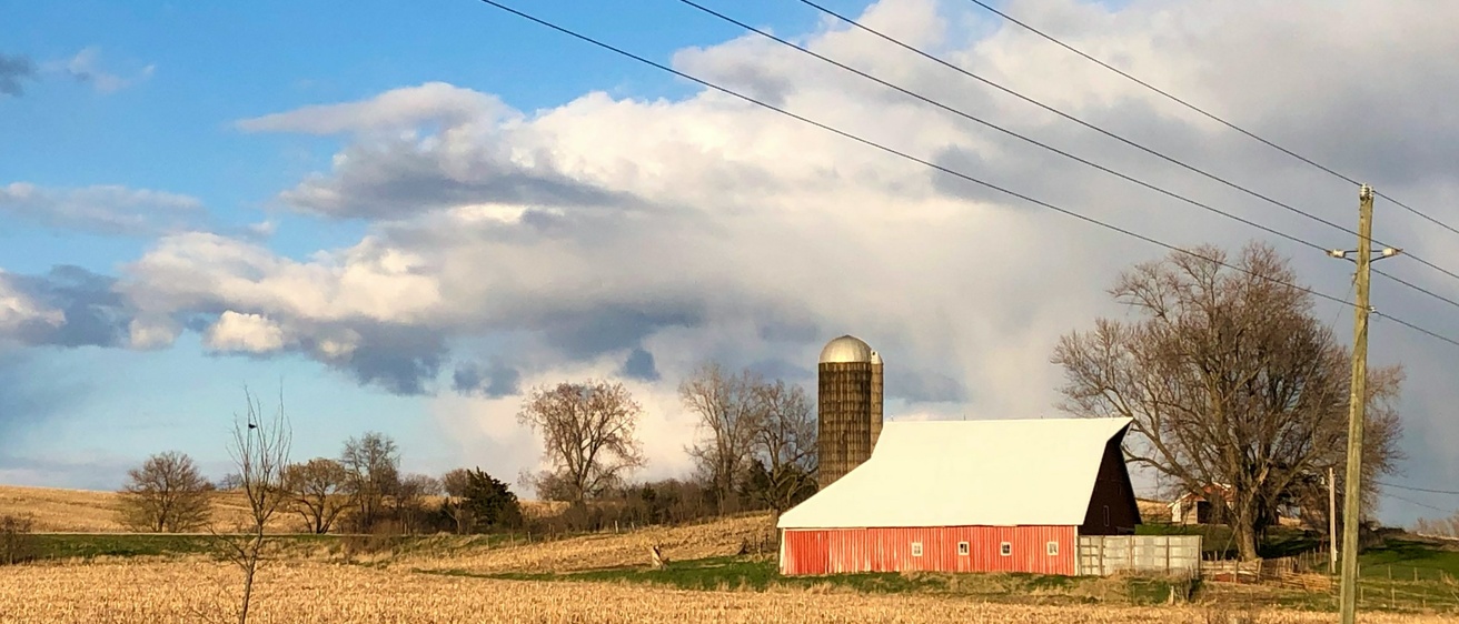 A red barn off a gravel road in Johnson County